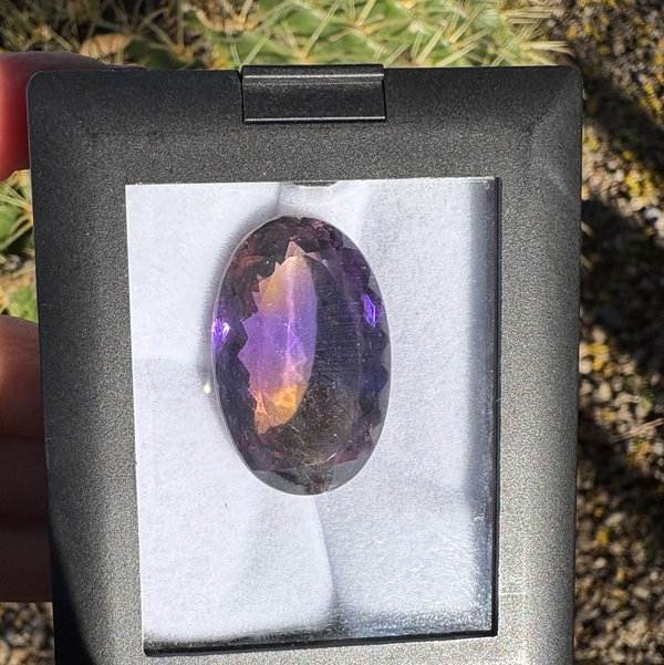 Closeup photo of 63.19ct Oval Ametrine Gemstone 31.77x20.58x14.10mm