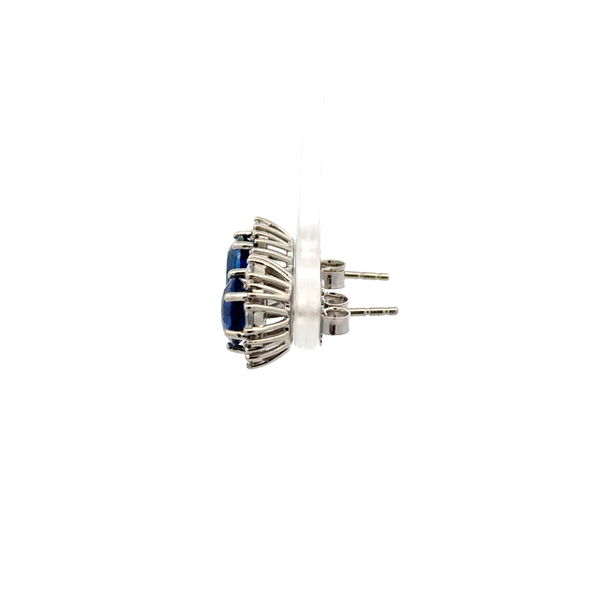 Closeup photo of 18K WG 4.13tcw Round Sapphire, .61tcw Marquis Diamond & .15tcw Sapphire Stud Earrings