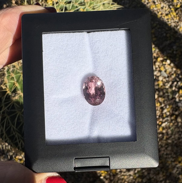 Closeup photo of 6.95ct Oval Rubellite Tourmaline 13.89x10.29x6.81mm