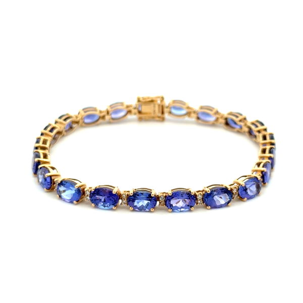 Closeup photo of 14K YG 11tcw Oval Tanzanite & .22tcw Diamond Line Bracelet 12.4g, 7"