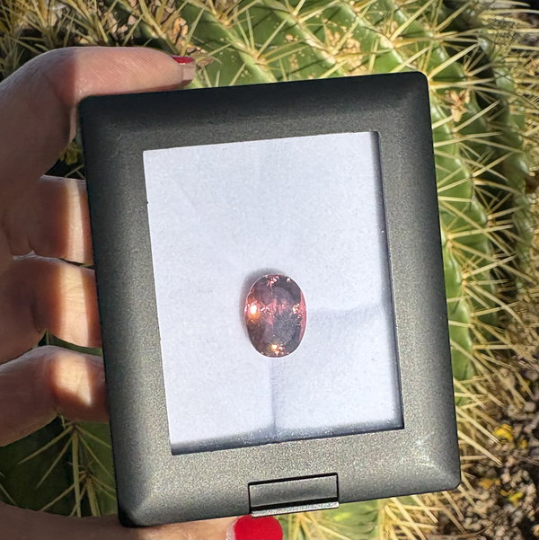 Closeup photo of 9.49ct Oval Rubellite Tourmaline 14.43x10.78x8.17mm