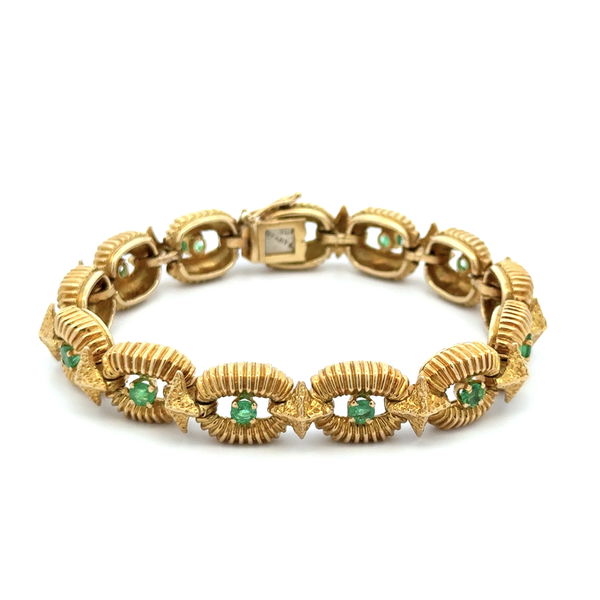 Closeup photo of 18K YG TIFFANY & CO 1.60tcw Emerald & Gold Fluted Bracelet 43.6g, 7"