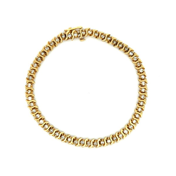 Closeup photo of 14K YG 1.50tcw 53 Round Diamond Tennis S Line Bracelet 12.4g, 7.5"