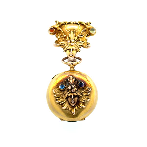Closeup photo of 14K YG Art Nouveau Medusa Face Pocket & Top Gemstones 27.6g, c1900