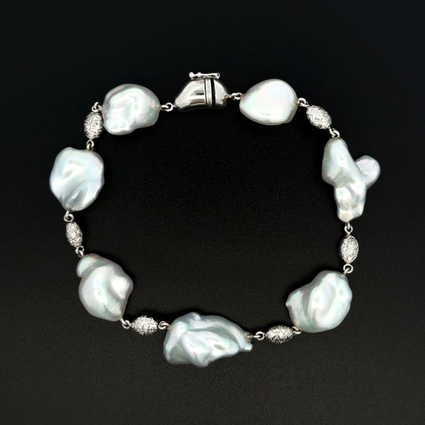 Closeup photo of 18K WG 7 - 12x20mm Baroque Pearl & .36tcw RBC Diamond Station Bracelet 22.9g, 8"