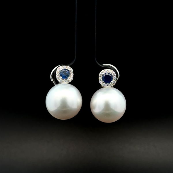Closeup photo of 18K WG 14mm South Sea Pearl, .60tcw Sapphire & .24tcw Diamond Earrings 13.6g