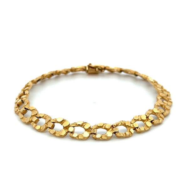 Closeup photo of 14K YG Horseshoe Link Nugget Style 8mm Bracelet 13.1g, 8”