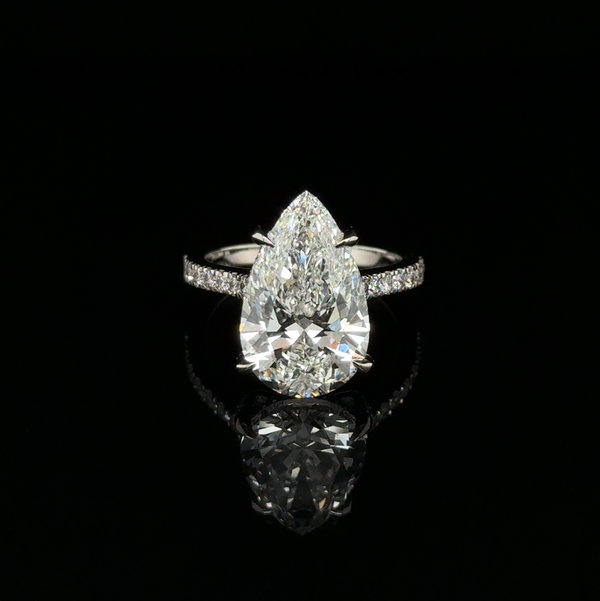 Closeup photo of 14k WG 6.05ct Lab Grown Diamond Pear IGI#LG761544802 & .60tcw LG RBC Engagement Ring 5.4g s6.5
