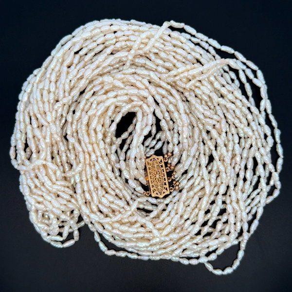 Closeup photo of 14K YG 12 Strand Keshi Pearl Necklace 96.1g, 30"