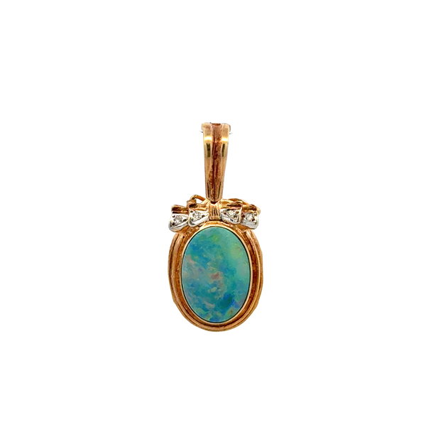 Closeup photo of 14K YG 3ct Boulder Opal & .02tcw Diamond Enhancer Openable Bale Pendant 5.0g