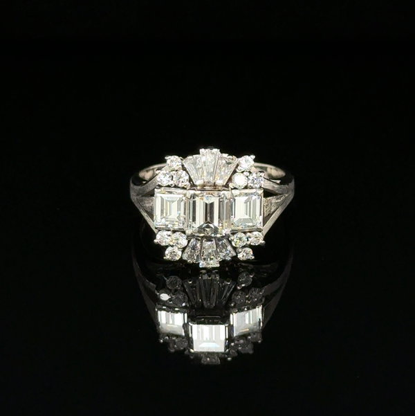 Closeup photo of Platinum .62ct. Emerald Cut & 1.17tcw Diamond Ring 8g s6.75