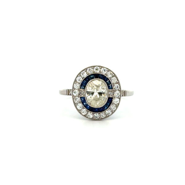 Closeup photo of Platinum .80ct. Oval Diamond & 56tcw. RBC Side Diamonds & .40tcw Sapphire Ring 3.7g s7.5