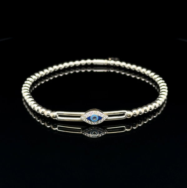 Closeup photo of 18K WG Designer Evil Eye .08tcw Diamond Stretch Bracelet 6.9g, 6.5"