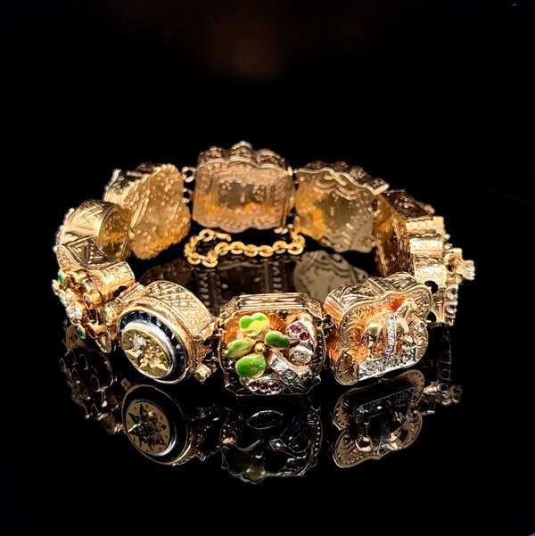 Closeup photo of 14K YG Ornate Horse Girl OEC Diamond, Sapphire, Gemstone Slide Bracelet 62.7g, 7"