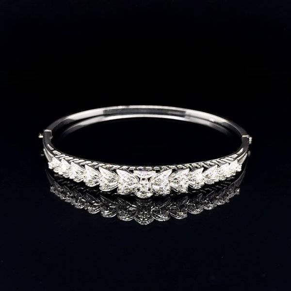 Closeup photo of 18K WG Mid Century 3 row 1.25tcw Diamond Bangle Bracelet 14.2g