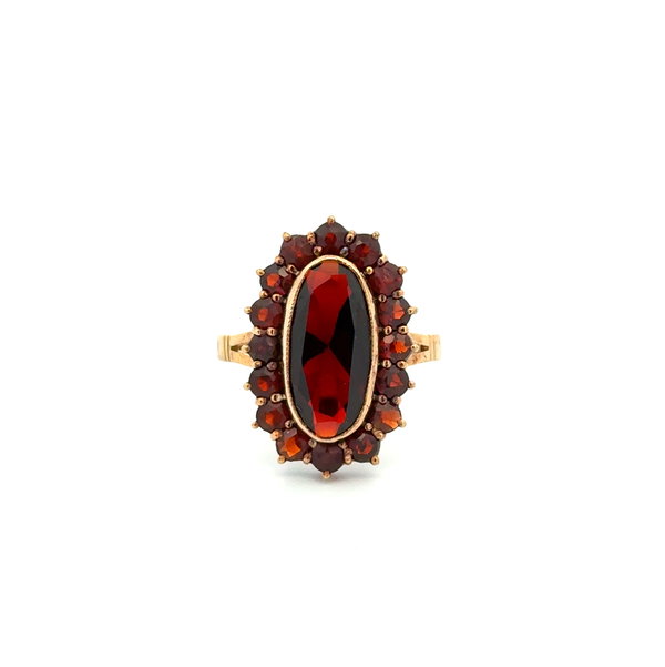 Closeup photo of 14K YG 3ct Oval Garnet & 1.60tcw Garnet Halo Ring 4.4g, s7.75