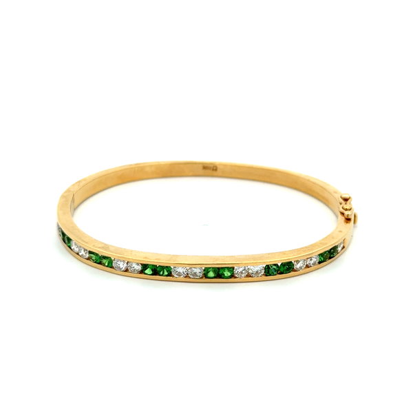 Closeup photo of 18K YG 1.50tcw RBC 12 Diamond & 1.20tcw Tsavorite Alternating Channel Set Bangle Bracelet 22.7g