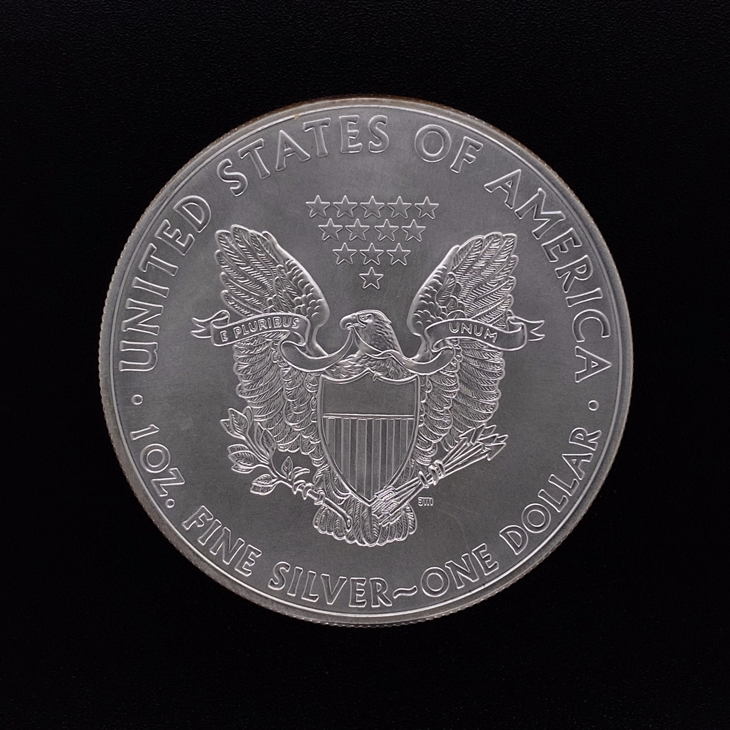 In 1986 the United States began striking the modern American Silver Eagle coin. The coin’s obverse design is patterned after Adolph A. Weinman’s (1870-1952) design of the Walking Liberty Half Dollar, used between 1916-1947. The reverse depicts the classic bald eagle, America’s classic symbol for liberty and freedom. 2011 United States Silver Eagle Coin MINT 1oz Pure