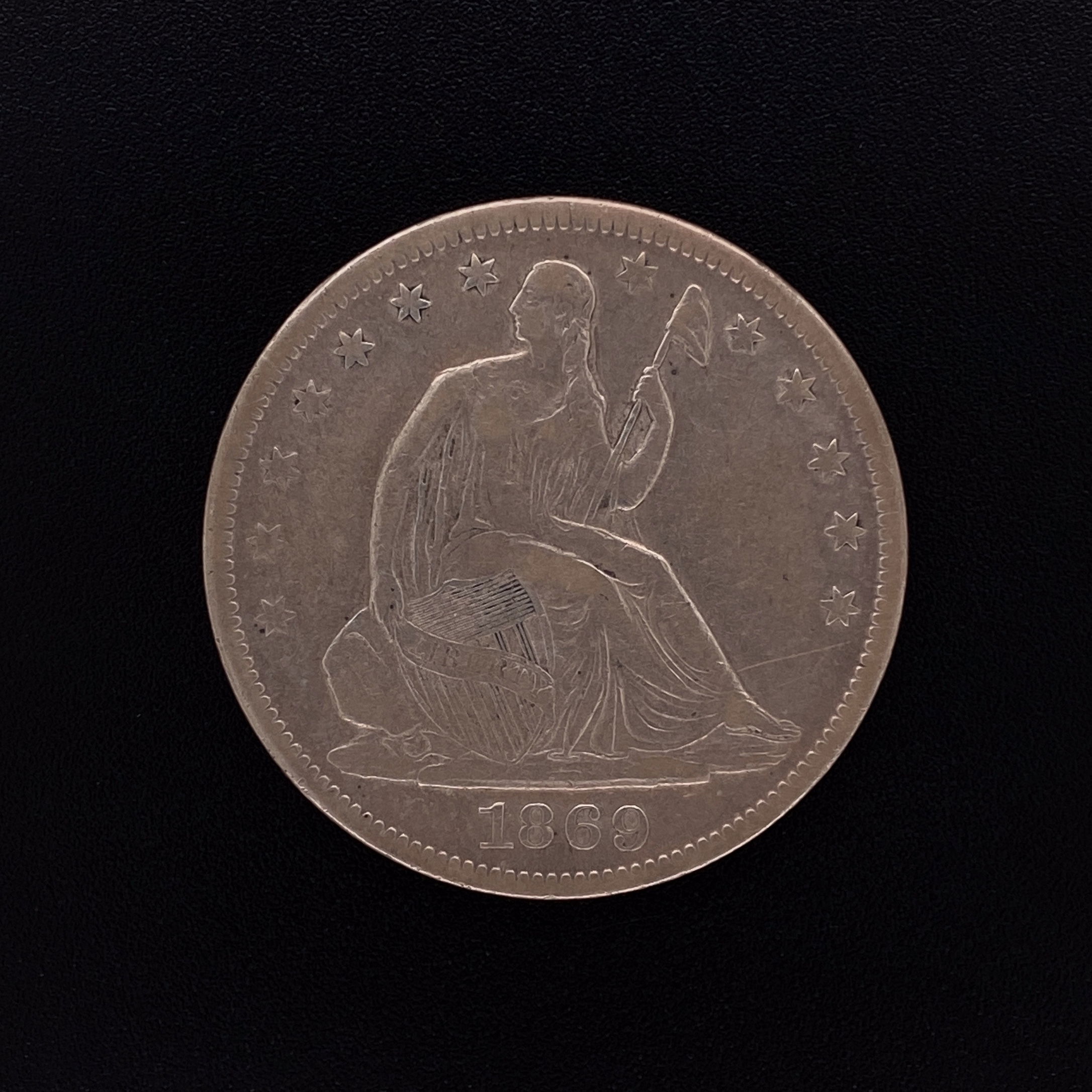 The Seated Half Dollar, or Seated Liberty Half Dollar as it is sometimes known, was the second variety of Half Dollar ever produced. First introduced in 1839, the coin was quite different from the Bust Half Dollar that preceded it. The design was altered and the general public absolutely loved the coin, which probably explains why it remained in production until the latter stages of the 19th century.Nowadays, collectors love these coins because they are incredibly rare and only growing rarer as time moves forward. These coins can be found, but it is very difficult to find them in excellent condition. Being that most every collector only likes to add well-preserved coins to their collection, collecting the Seated Half Dollar is something that becomes painstaking and expensive. 1869 - S Seated Liberty Half Dollar $0.50 Piece Very Fine Condition