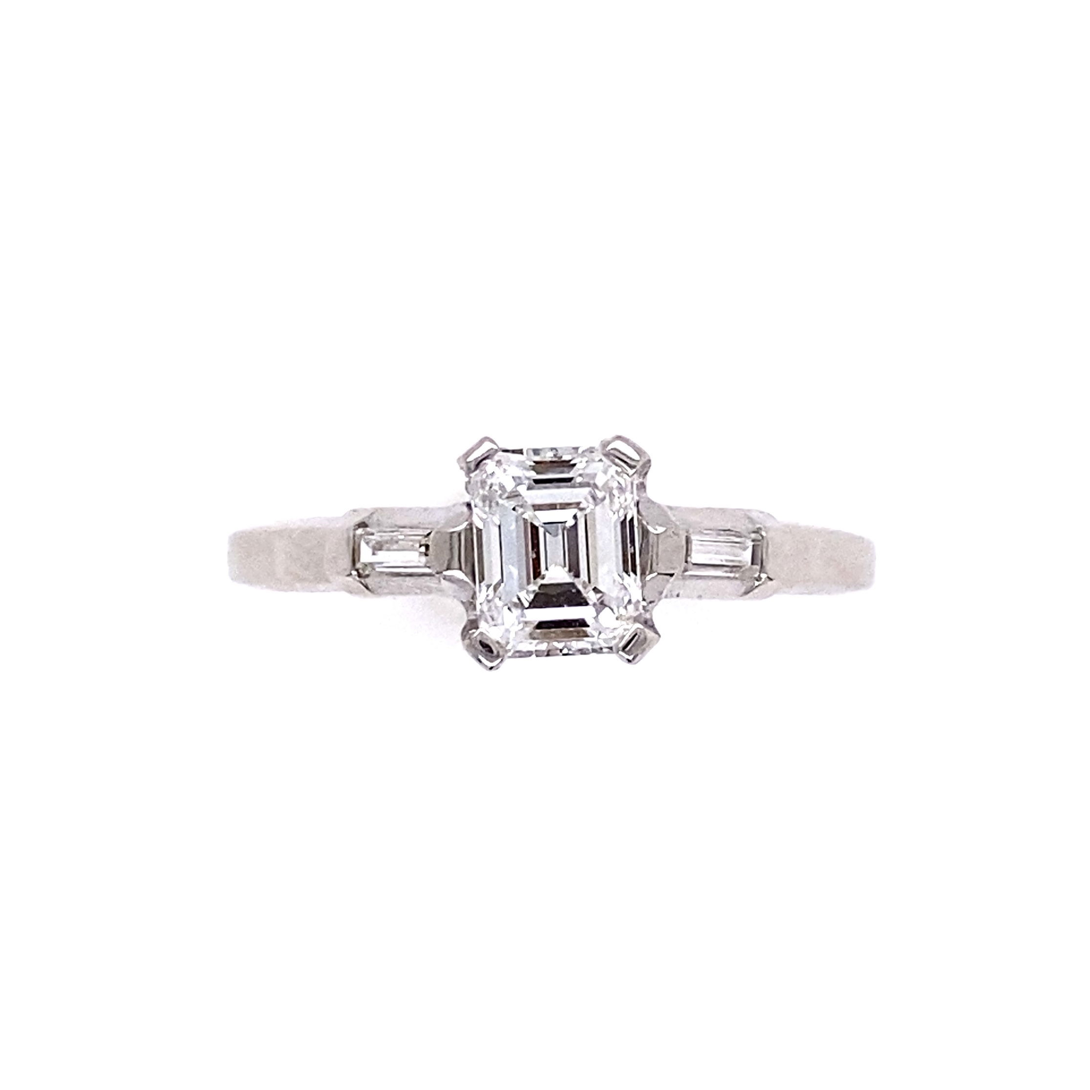 GIA # 22057283210 Platinum .66ct Emerald Cut Diamond E-VS1 & .10tcw Side Diamonds, s6.75