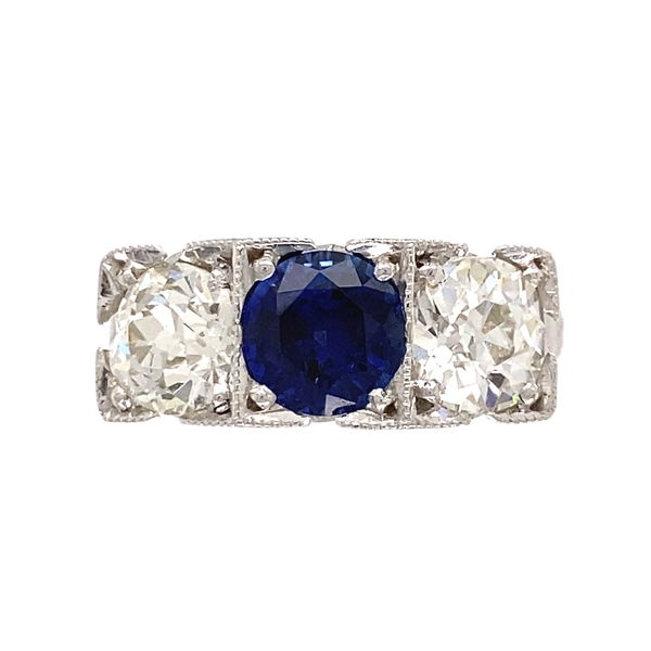 Closeup photo of 14K WG 1.40ct Round Sapphire, 1.00ct & .97ct OEC Diamond 3 Stone Ring. s7.75