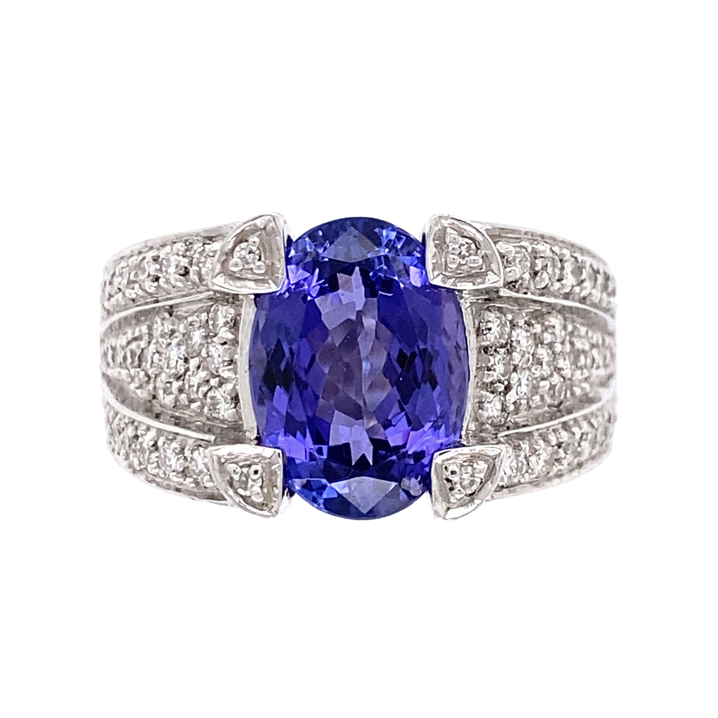 18K WG 3ct Oval Tanzanite & .38tcw Diamond Ring 11.1g, s6.75