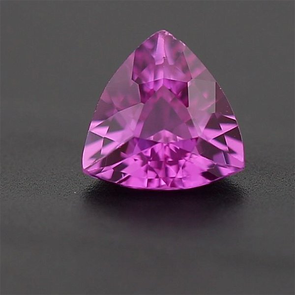 Closeup photo of 0.77ct Trillion Cut (H) Pink Sapphire