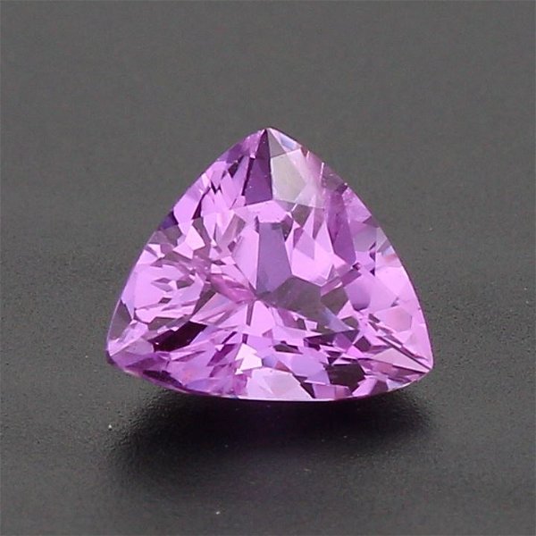 Closeup photo of 0.98ct Trillion Cut Lavender Sapphire