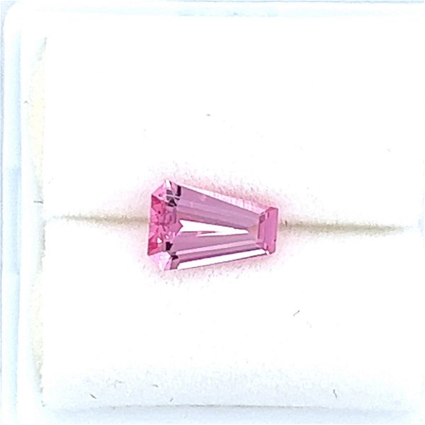 Closeup photo of .68ct Tapered Baguette Cut Pink Spinel