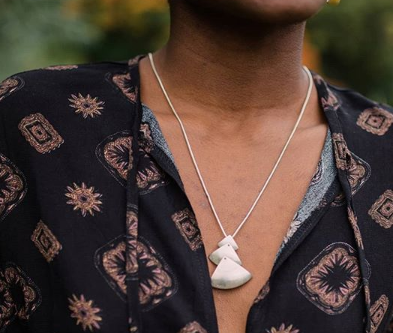neutral skin tone with silver necklace