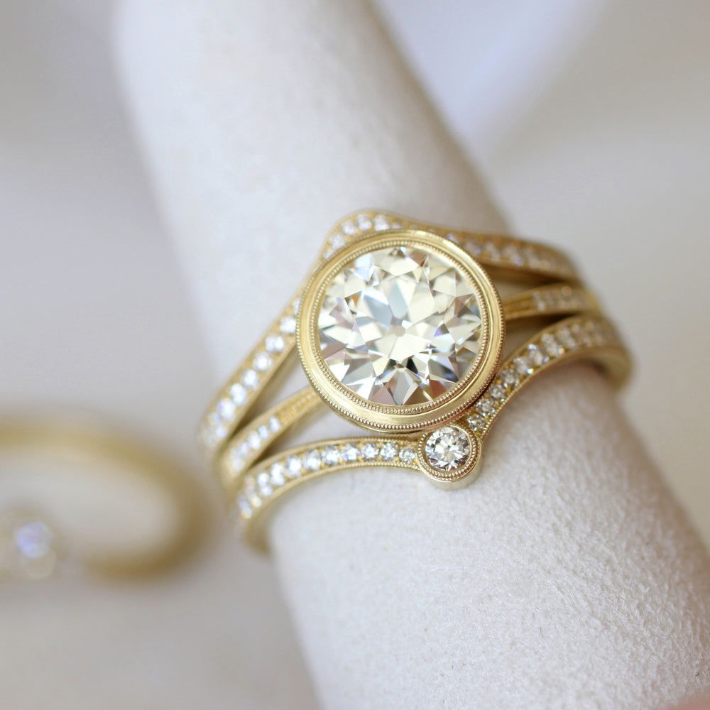 erika winters engagement ring with milestone stacking bands