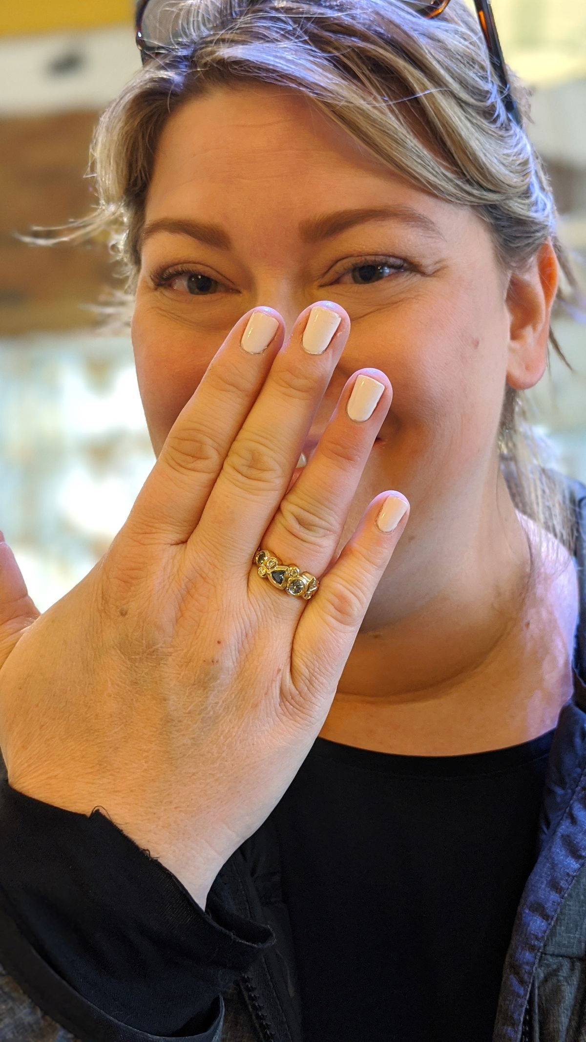custom design customer responding with joy to receiving their new jewelry