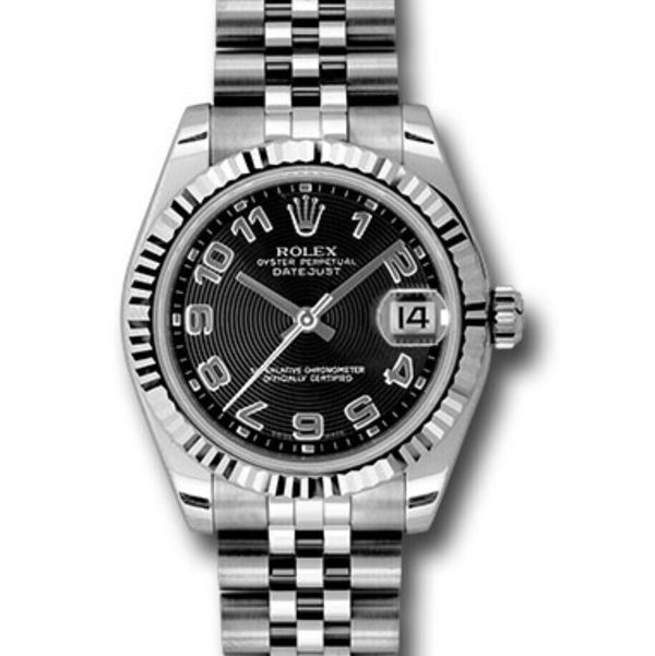 Closeup photo of 31mm stainless steel case, 18k white gold fluted bezel, black concentric circle dial, Arabic numerals, and Jubilee bracelet.