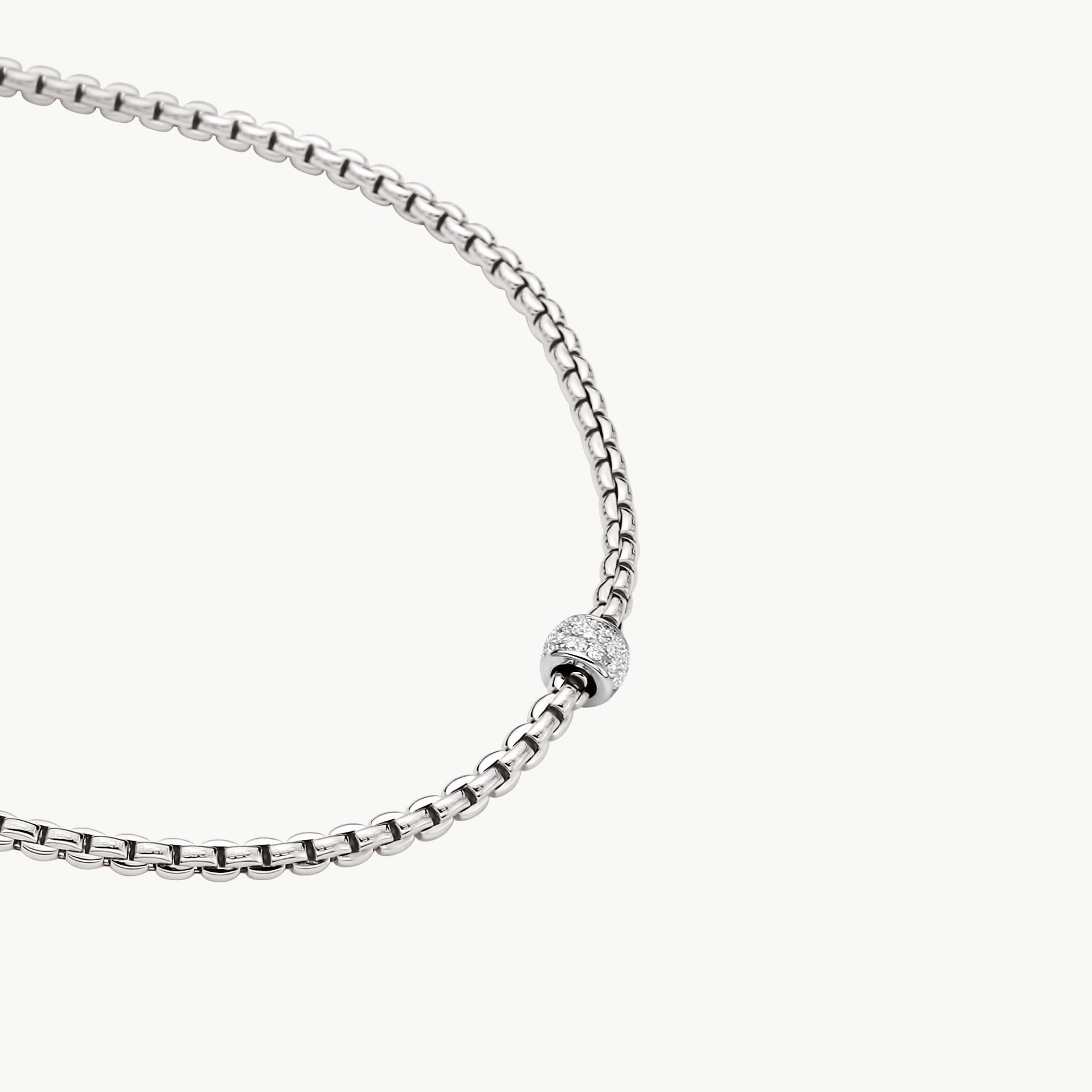 Eka Tiny Collection rope necklace in 18kt white gold with white gold element covered in 0.19ctw of white diamond pave - The necklace measures 3mm in diameter and 70cm (27.5 inches) 730C PAVE-W-70CM Eka Tiny Collection Rope Necklace in 18kt White Gold with White Gold and White Diamond Element - 3mm - 70cm