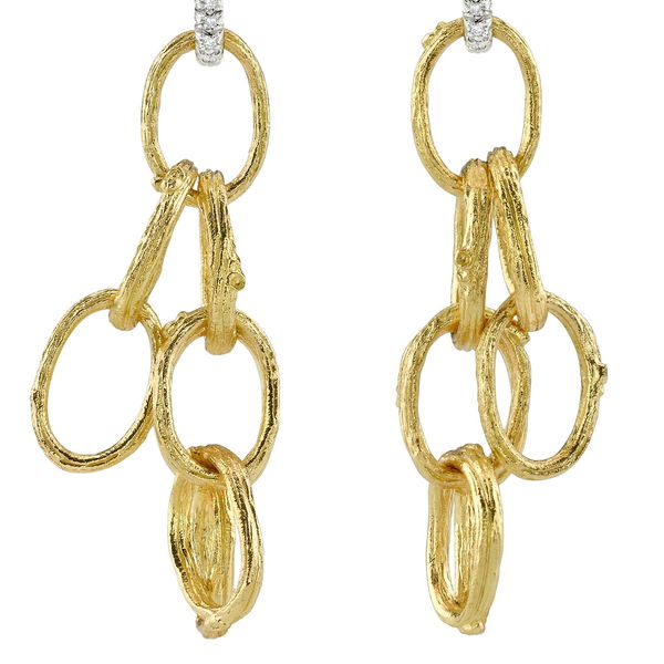 Closeup photo of Open Branch Dangle Earrings with Diamond Tops in 19kt Yellow Gold