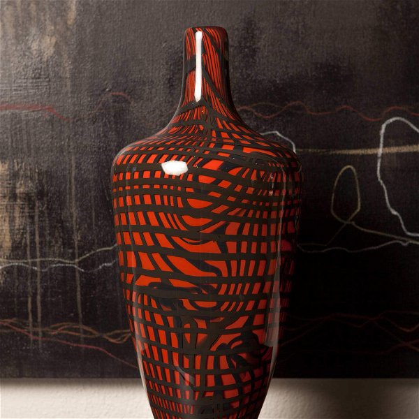 Closeup photo of Red and Black Glass Bottle Vase