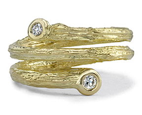 Three Row Olive Branch Coil Ring with Diamonds in 18kt Yellow Gold by Aaron Henry Designs. Three coiling rows of 18kt yellow gold cast with Aaron's olive branch texture wind up the finger. Each end is capped with a single white diamond. Diamond weight is 0.11ctw Three Row Olive Branch Coil Ring with Diamonds in 18kt Yellow Gold