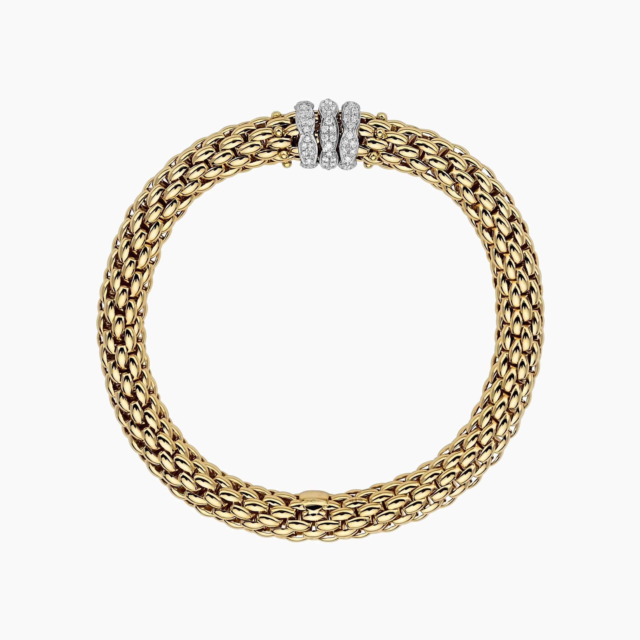 Love Nest Flex'It Bracelet in 18kt Yellow Gold with three White Gold and White Diamond pave Elements at 0.57ctw - The bracelet measures 7.3mm in diameter and is a size extra small, 15cm or 5.90 inches internal circumference. 451B PAVEXS-YW Love Nest Bracelet in 18kt Yellow Gold with 3 White Gold and White Diamond Pave Elements - 7.3mm - Size XS