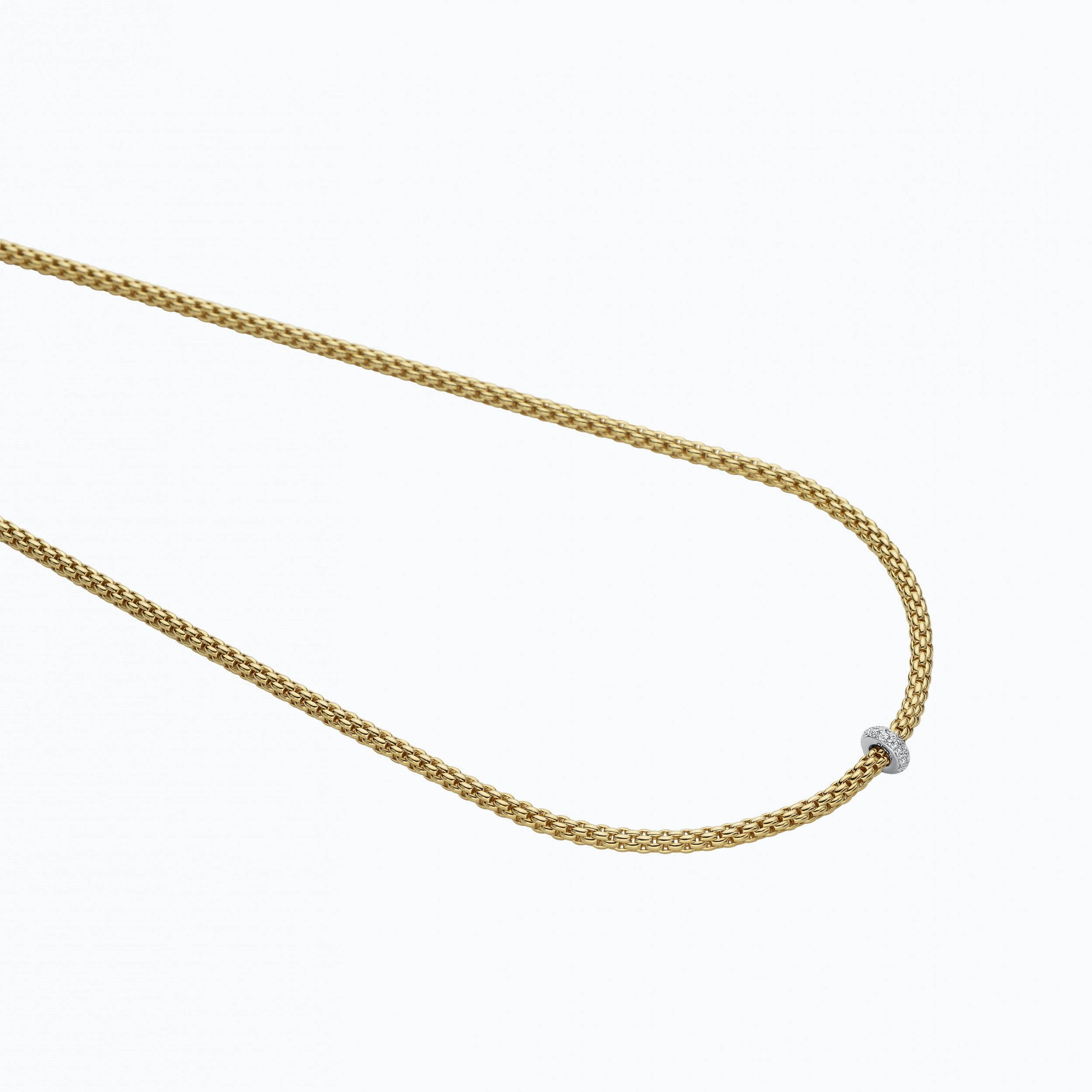 Prima Necklace in 18kt Yellow Gold with White Gold element covered in 0.18ctw white diamond pave - The necklace measures 3mm in diameter and 43cm (17 inches) long. 745C BBR-YW-43CM Prima Necklace in 18kt Yellow Gold with White Gold and White Diamond Element - 3mm - 43cm