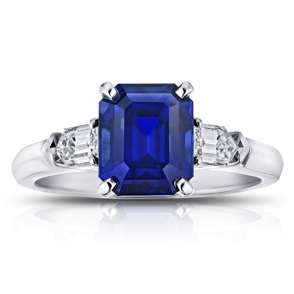 Closeup photo of 3.72 Carat Emerald Cut Blue Sapphire with Straight Bullet Diamonds .52 Carats Set in a Platinum Ring