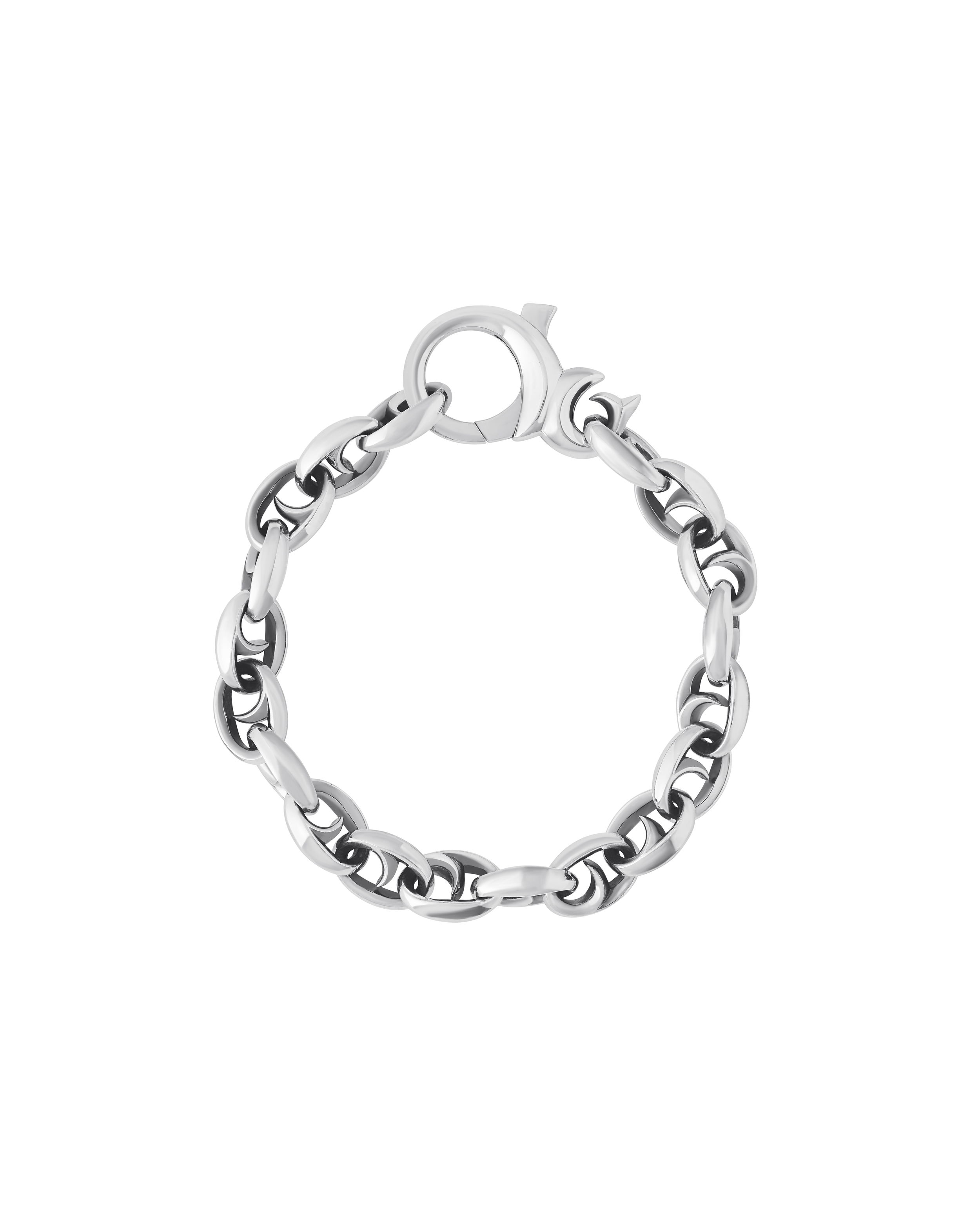 Thorn Addiction Medium Oval Link Bracelet in Sterling Silver by Stephen Webster. Polished fifteen link bracelet measuring 9" long with signature Thorn clasp. A bed of metallic thorns wrap around your wrist, the Thorn Medium Oval Bracelet is crafted in recycled Sterling Silver. Thorn Addiction Medium Oval Link Bracelet in Sterling Silver