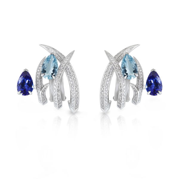 Closeup photo of Thorn Embrace Entangled Earrings with Aquamarine and Tanzanite in 18kt White Gold