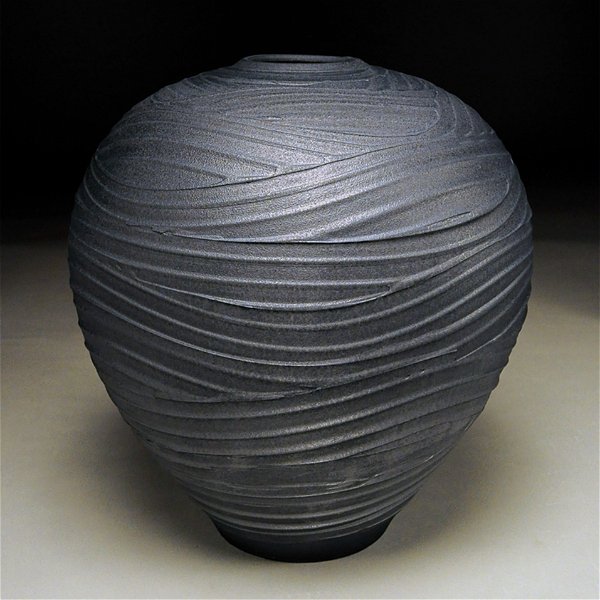 Closeup photo of Earthenware Carved Graphite 14x13