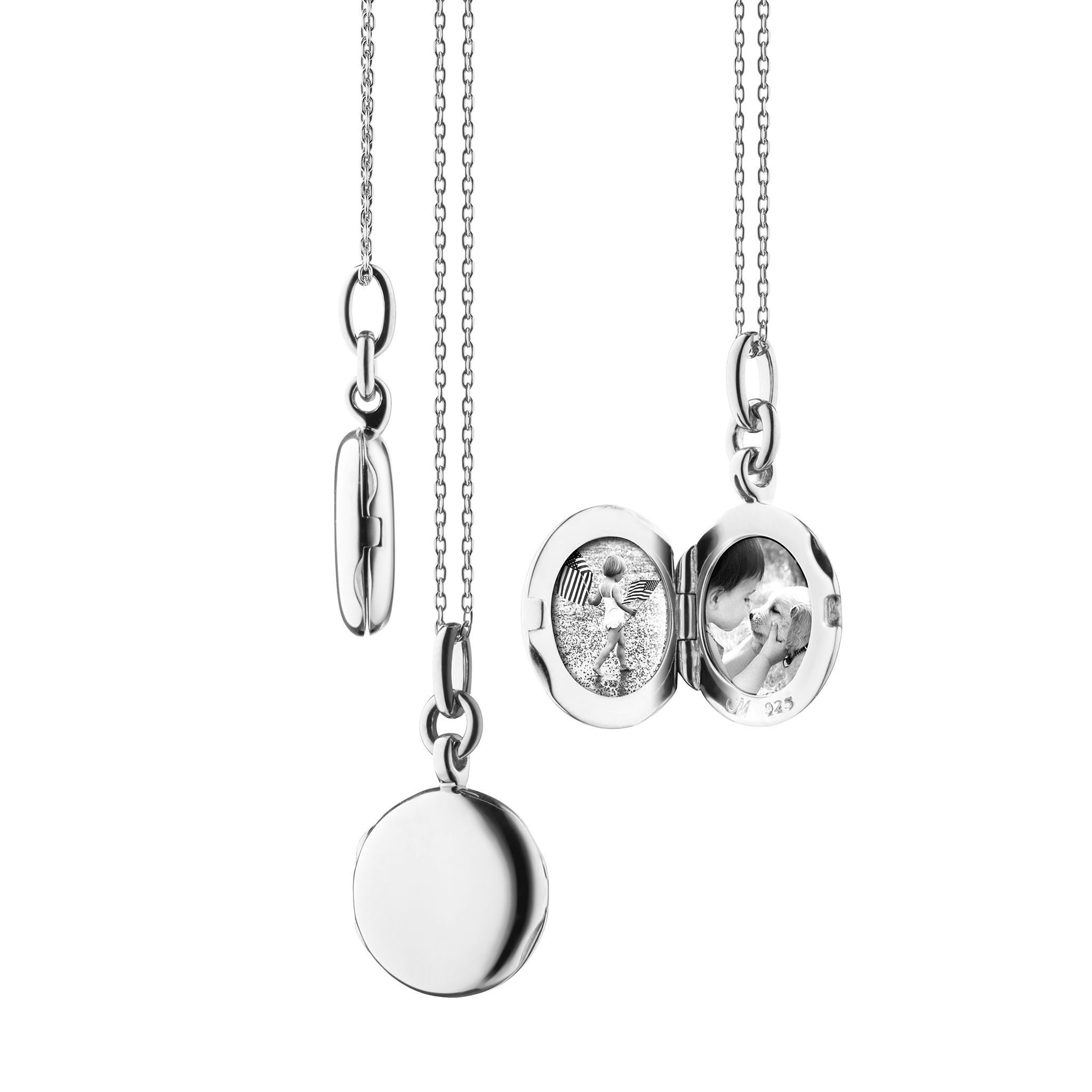 This charmingly elegant sterling silver slim round locket brought to you by Monica Rich Kosann brings modern style and sophistication. It comes with an 18" delicate diamond cut chain. “Nan” Locket (Sterling Silver)