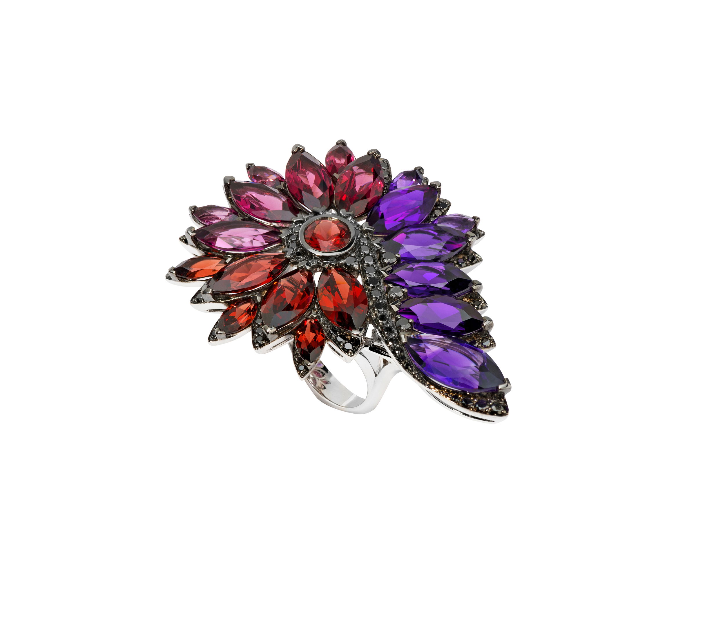 No Regrets Magnipheasant Feathers Cocktail Ring with Garnets and Amethyst in 18kt White Gold - Size 7 by Stephen Webster. Statement ring in 18kt white gold with red garnets at 5.08ctw, rhodolite garnets at 5.13ctw, amethysts at 5.97ctw and black diamond pave at 0.58ctw. No Regrets Magnipheasant Feathers Cocktail Ring with Garnets and Amethyst in 18kt White Gold - Size 7