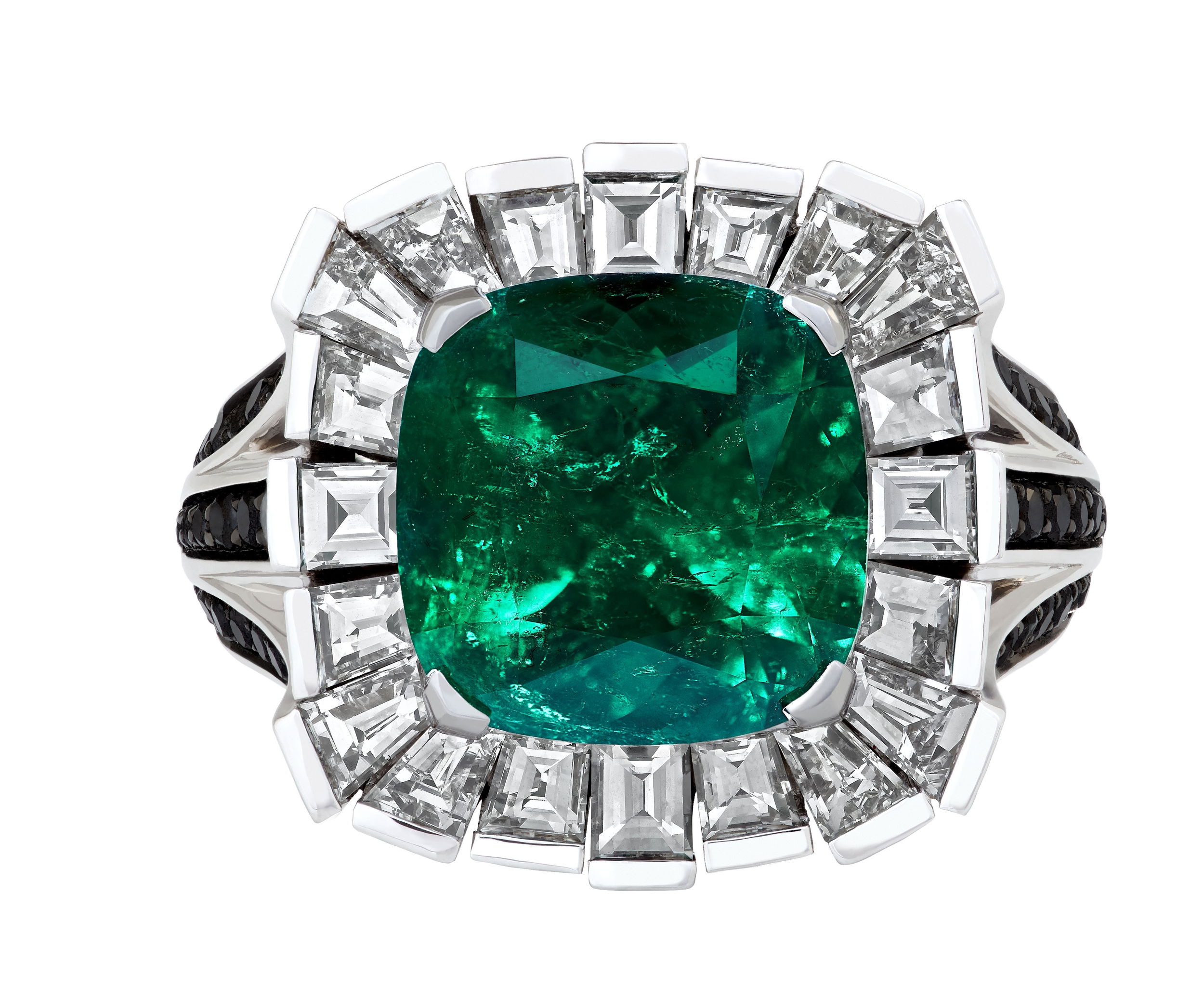 No Regrets Skyline Ring with 5.56ct Muzo Emerald in 18kt White Gold - Size 7 by Stephen Webster. Cocktail ring in 18kt white gold featuring a center cushion cut Muzo emerald at 5.56ct and accented with 1.19ctw of white diamonds, 0.55ctw of silver diamonds and 0.55ctw of black diamonds. The emerald has a Muzo certificate stating it has a resin treatment. No Regrets Skyline Ring with 5.56ct Muzo Emerald in 18kt White Gold - Size 7