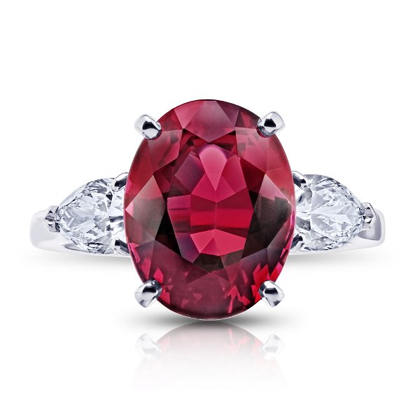 Closeup photo of 6.05ct Oval Red Spinel with Diamonds in Platinum and 18kt Yellow Gold Setting