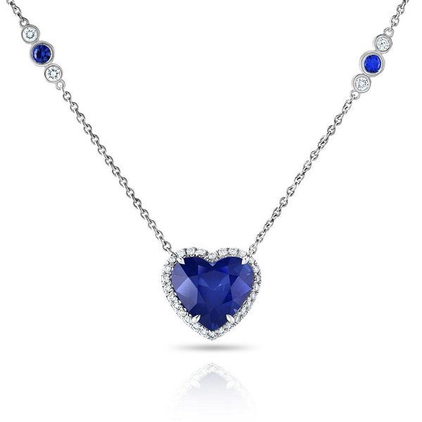Closeup photo of 6.02ct Blue Sapphire Heart with Diamonds in Platinum Setting