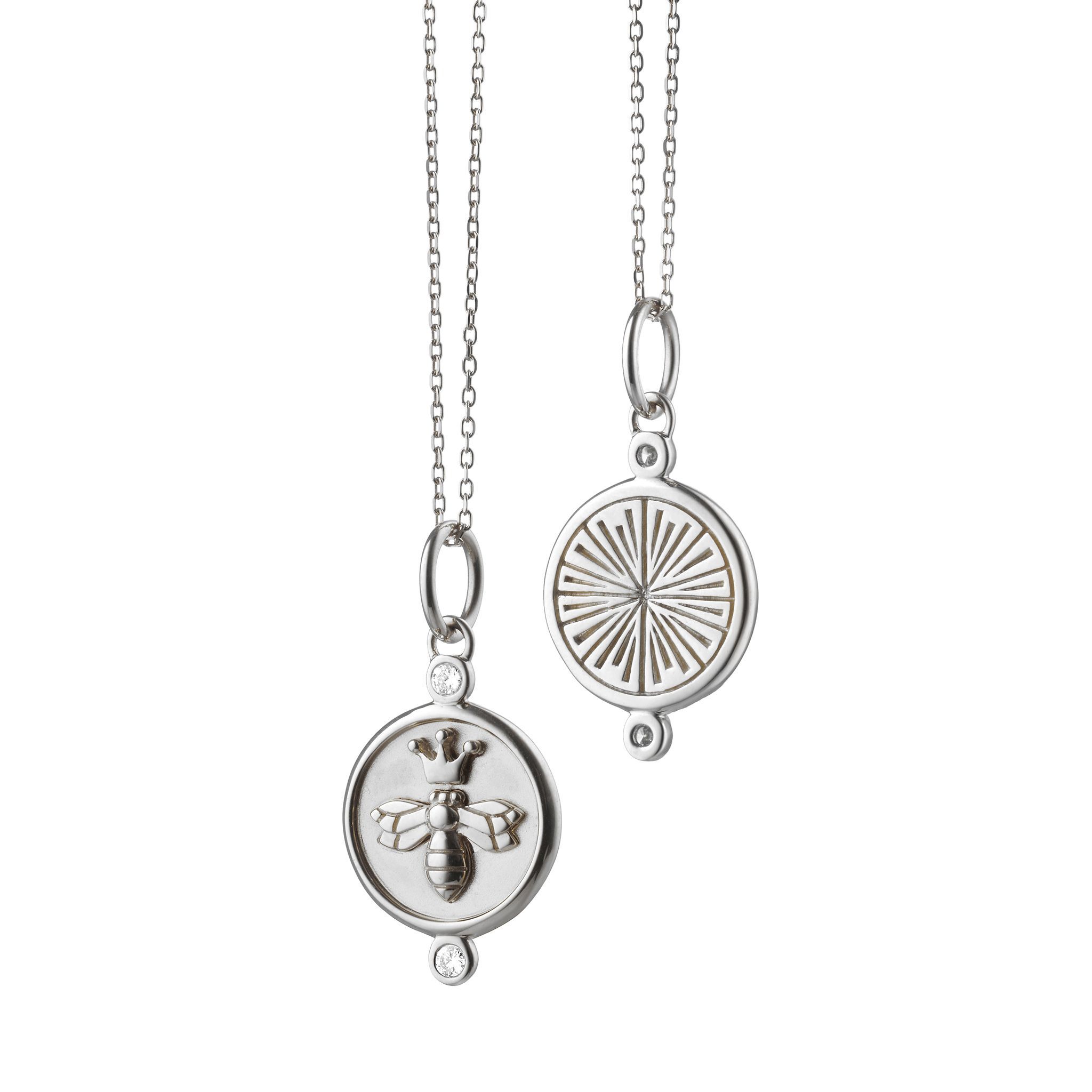 This truly dazzling sterling silver “Queen Bee” charm brought to you by Monica Rich Kosann brings absolute beauty and elegance. It features gorgeous white sapphires and comes with an 18” shain with loops at 17” and 16". “Queen Bee” Charm