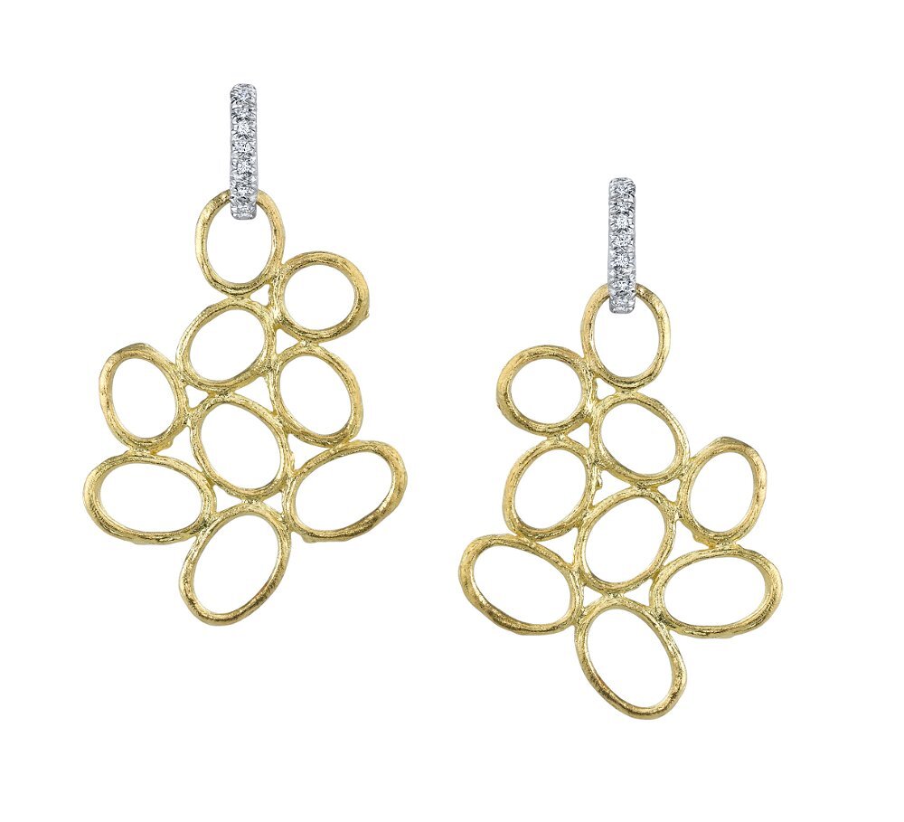 Larger Free Form Open Olive Branch Earrings Hanging From Diamond Stems in 19kt Yellow Gold by Aaron Henry Designs. 19kt yellow gold free form ovals are joined together in a larger size pattern and dangle off of an 18kt white gold stem with 0.11ctw white diamond accents. Larger Free Form Open Olive Branch Earrings Hanging From Diamond Stems in 19kt Yellow